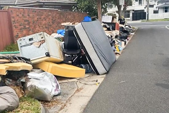 A pile of hard rubbish at the corner of Tucker Road and Brosa Avenue in Bentleigh that police cordoned off  and searched on Tuesday.