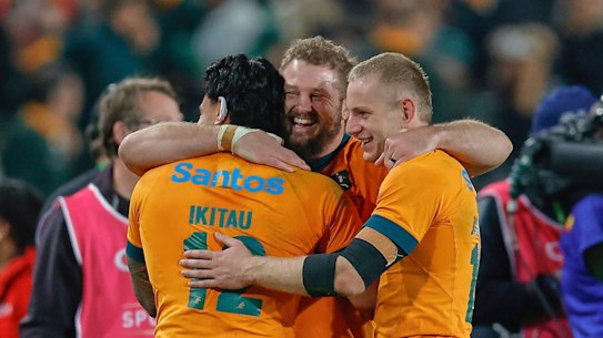 Wallabies celebrate.