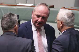Minister for Resources, Water and Northern Australia Keith Pitt (left) huddles with new Deputy PM Barnaby Joyce and Nationals MP Damian Drum, who introduced an amendment in the House that flatly contradicted the Liberal stance on the Murray-Darling Basin Plan.