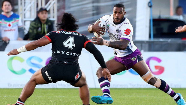 Run it straight: Suliasi Vunivalu is challenged by Solomone Kata.