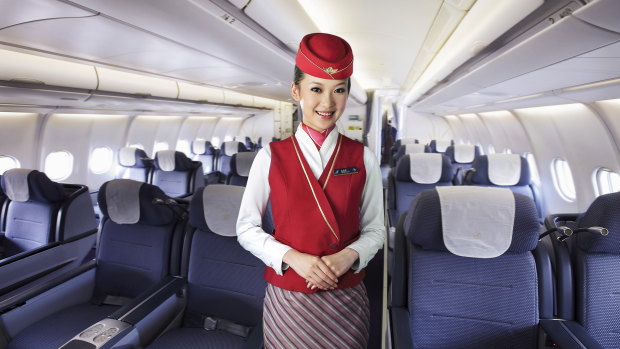 A flight attendant on a China-domiciled airline.