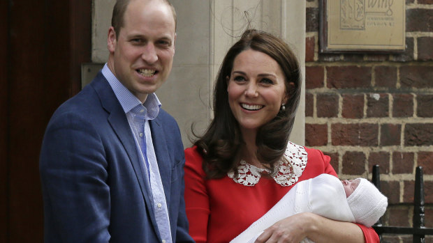 Prince William and Kate, Duchess of Cambridge smile as they hold their newborn son outside St Mary's Hospital in London on Monday, April 23.