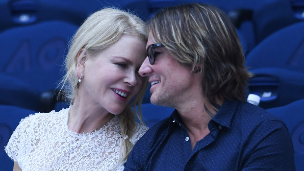 Nicole Kidman and Keith Urban watching the women's singles semi-final match on day 11 of the Australian Open in Melbourne on Thursday.