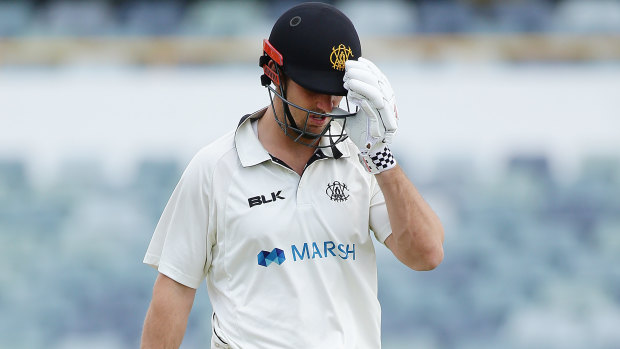 Heading for trouble: Warriors captain Mitchell Marsh walks off after being dismissed by Jackson Bird of the Tigers on day four of the Sheffield Shield match at the WACA.