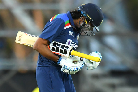 Jhulan Goswami celebrates after hitting the winning runs against Australia.