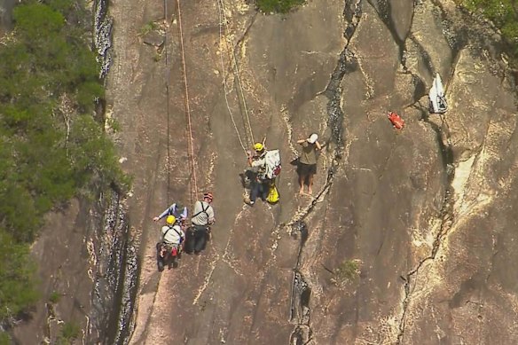 Search and rescue teams rescued two 18-year-old hikers who fell off a cliff on Beerwah Mountain on Sunday.