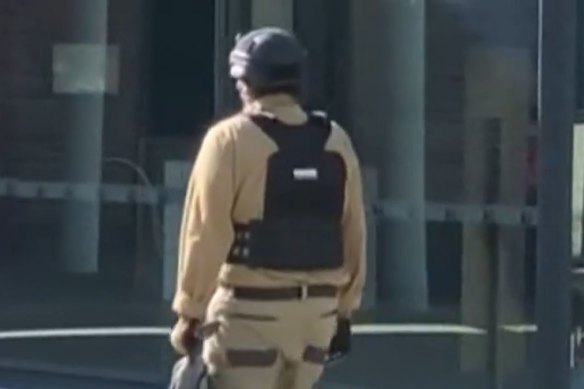 The teenager was seen in tactical gear.