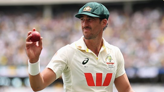 Mitchell Starc basks in the crowd’s adulation.