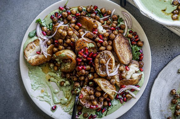 An Indian-inspired snack of spice roasted potatoes, chickpeas and mint yoghurt.