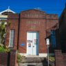 Covered in graffiti, these buildings all look the same. A Sydney council wants them heritage listed