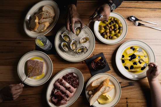 Snacks at Dutch Rules include terrine, charcuterie, oysters and parmigiano reggiano.