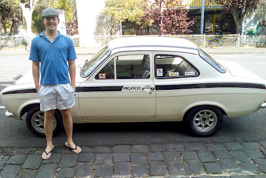 Tom Cowie with his first car, a 1972 Ford Escort. It needed to be fed and a job beckoned.