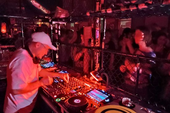 Adam Bandt on the decks at Revs.