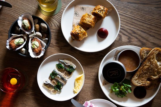 Hot smoked sardines, lamb sausage roll; Southern-style fried oysters and potted pig rillettes.