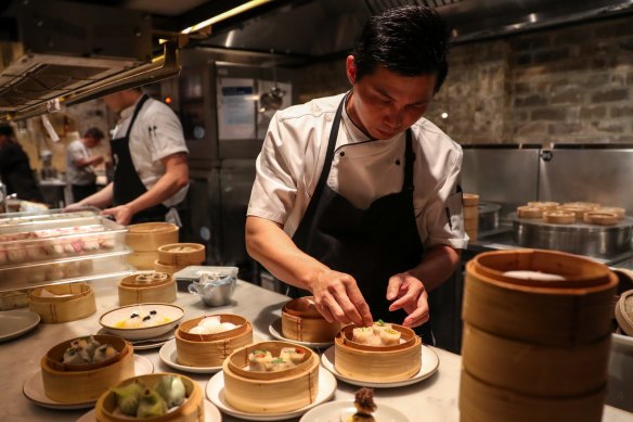 A master dim sum maker folding dumplings at Mr Wong. 