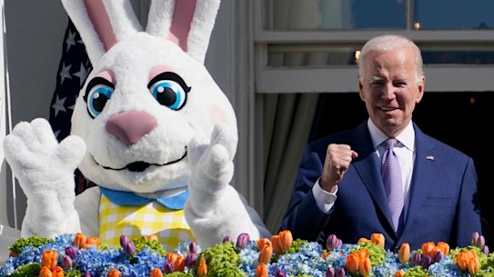 US President Joe Biden and first lady Jill Biden stand on the Blue Room Balcony as they participate in the 2023 White House Easter Egg Roll, on Monday.