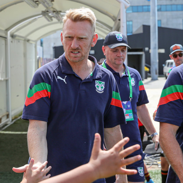Warriors coach Andrew Webster greets fans during the pre-season.