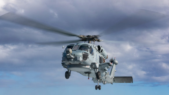 A MH-60R Seahawk Helicopter had flares dropped in front of it by a Chinese fighter jet. 