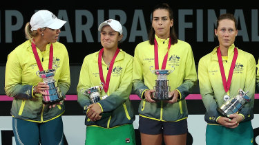 Tough loss: Australian team captain Alicia Molik, left, with Ashleigh Barty, Ajla Tomljanovic and Samantha Stosur during the post-match presentations.