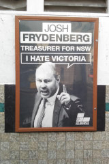 A poster in Kooyong depicts Josh Frydenberg as “Treasurer for NSW”, a line used by Monique Ryan to attack him in their televised debate.