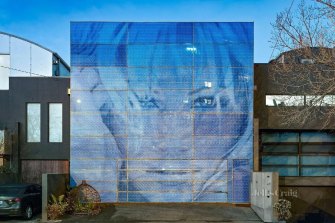 The home with Pamela Anderson’s face on the facade at 270 Canterbury Road, St Kilda West, has hit the market with an asking price of $2.3 million to $2.4 million.