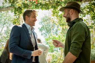Hughes and Ryan Reynolds on the set of The Hitman’s Wife’s Bodyguard.