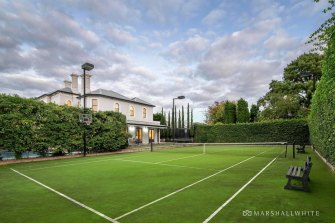 The home includes a tennis court.
