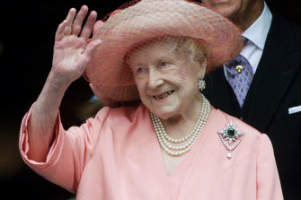 The Queen Mother waves to well-wishers in London in 2000.
