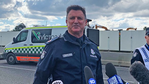 Assistant Commissioner Bob Hill speaking at the scene on Thursday.  