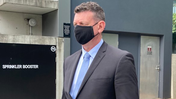 Detective Bryan Anthony Swift leaves Brisbane Magistrates Court on Tuesday.
