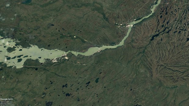 The rugged terrain surrounding the township of Gillam, centre left, in Manitoba, Canada.