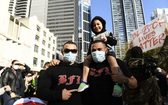 Sydney Black Lives Matter protest. Chad Brown with his son and friend William Pires. 