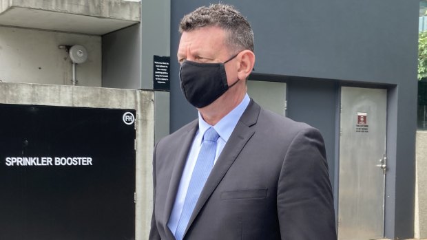 Detective Bryan Anthony Swift leaves Brisbane Magistrates Court on Tuesday.