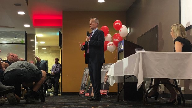 Bill Shorten speaks at the Caboolture town hall meeting with Susan Lamb (right).