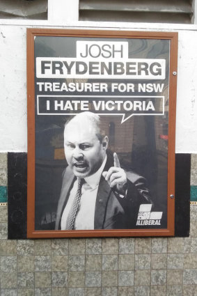 A poster in Kooyong depicts Josh Frydenberg as “Treasurer for NSW”, a line used by Monique Ryan to attack him in their televised debate.