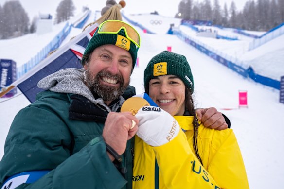 Australian moguls coach Peter McNiel with Jakara Anthony and the gold medal that makes her the country’s most successful winter athlete.