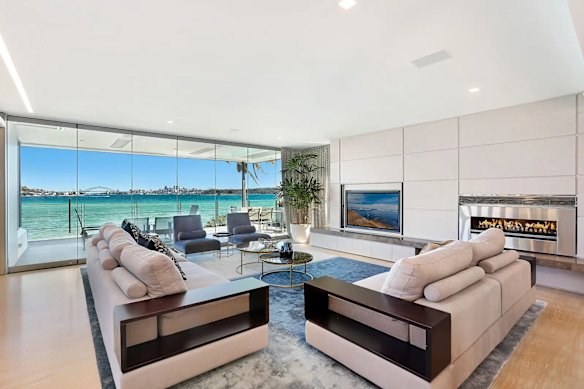 The four-level, five-bedroom, six-bathroom mansion offers 180-degree views of the Harbour, Bridge and city skyline.