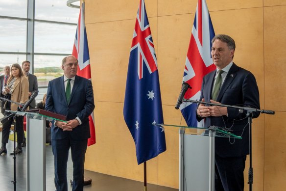 UK Defence Secretary Ben Wallace (left) with Defence Minister Richard Marles in the UK earlier this year.