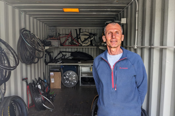 Carbon bike specialist Raoul Luescher with the few salvaged bike pieces from his workshop.