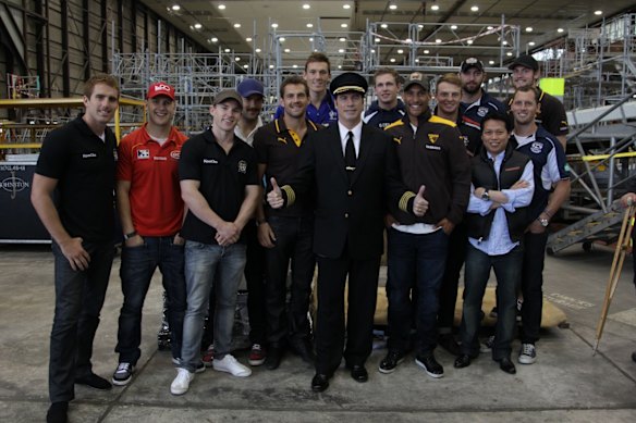 Nguyen, John Travolta and AFL royalty. There is no suggestion others photographed with Nguyen are involved in his alleged behaviour.