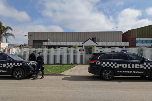 Police raiding a Hells Angels clubhouse in 2020.