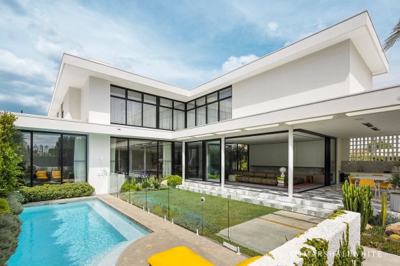 The five-bedroom house has a pool and outdoor entertaining area.