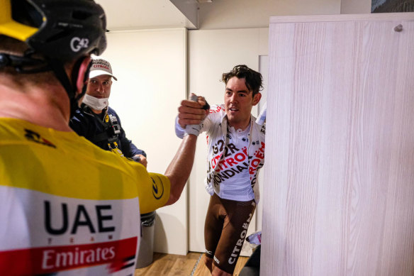 Mutual respect: Ben O’Connor shakes hands with Tadej Pogacar at the 2021 Tour. 