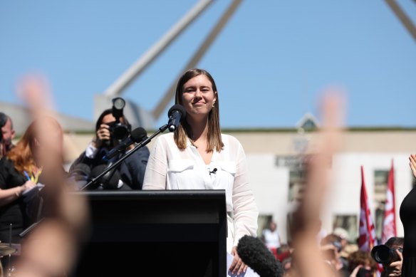 Brittany Higgins addresses thousands of people outside Parliament House.