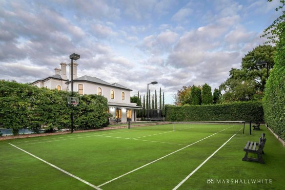 The home includes a tennis court.