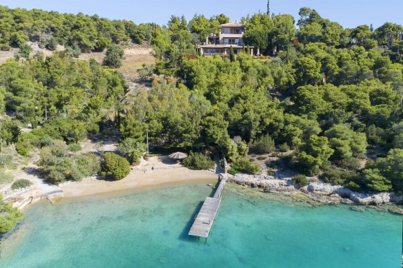 This beach house comes with its own beach bungalow.