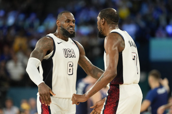 United States’ LeBron James and Kevin Durant celebrate a basket against Serbia during a men’s semi-finals. 