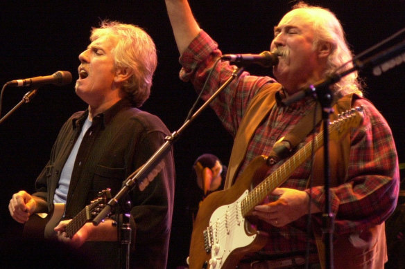 Nash, left and David Crosby on stage in Michigan in 2000.
