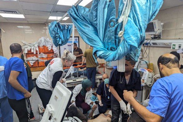 Rebecca Smith treating patients in the red zone in Gaza. 