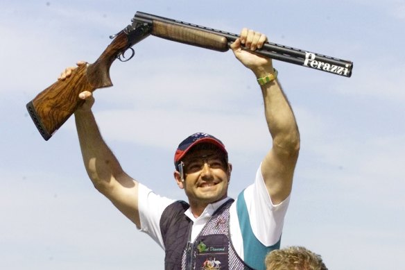 Australian shooter Michael Diamond celebrates after winning the gold medal in the Men's Trap Final at the Sydney International Shooting Centre.